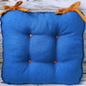 Blue Cushion with Orange Accents